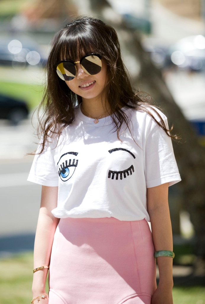 Nicole Zhang, 23, was spotted at UC Irvine on Wednesday wearing a Chiara Ferragni sequined-eyes cropped T-shirt and a pink flair skirt.